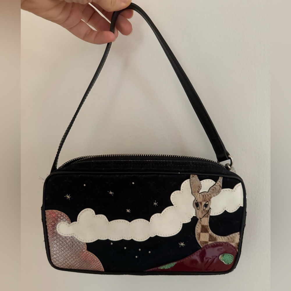 Louis Vuitton vintage conte de fees pochette.